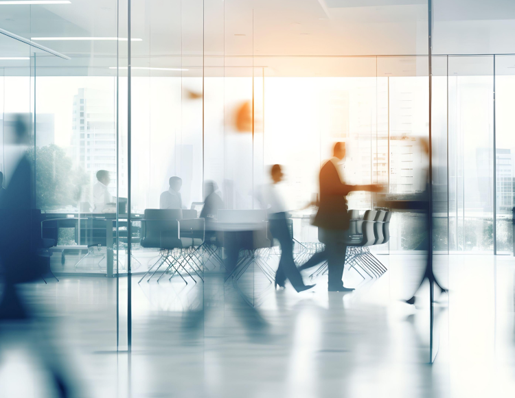 People walking through an office