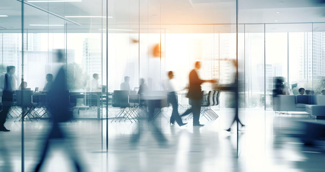 People walking through an office